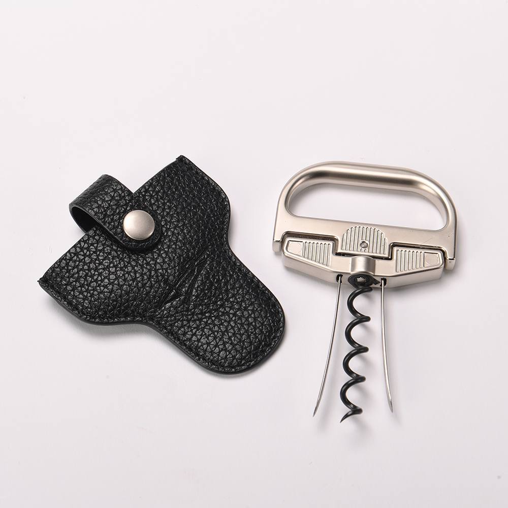 The Durand vintage corkscrew beside its black leather pouch