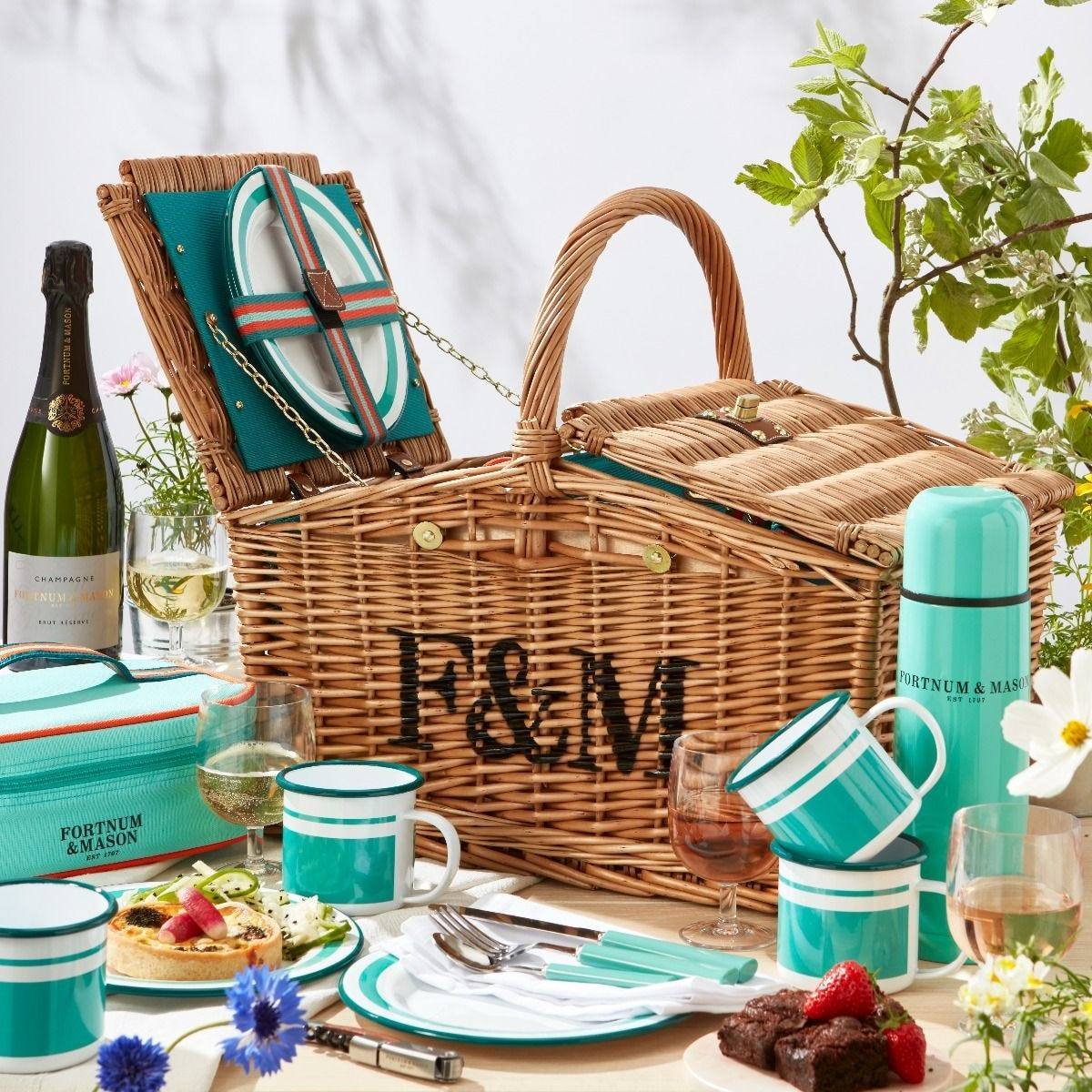 Fortnum and Mason Huntsman picnic hamper for four, wicker basket with enamelware and champagne