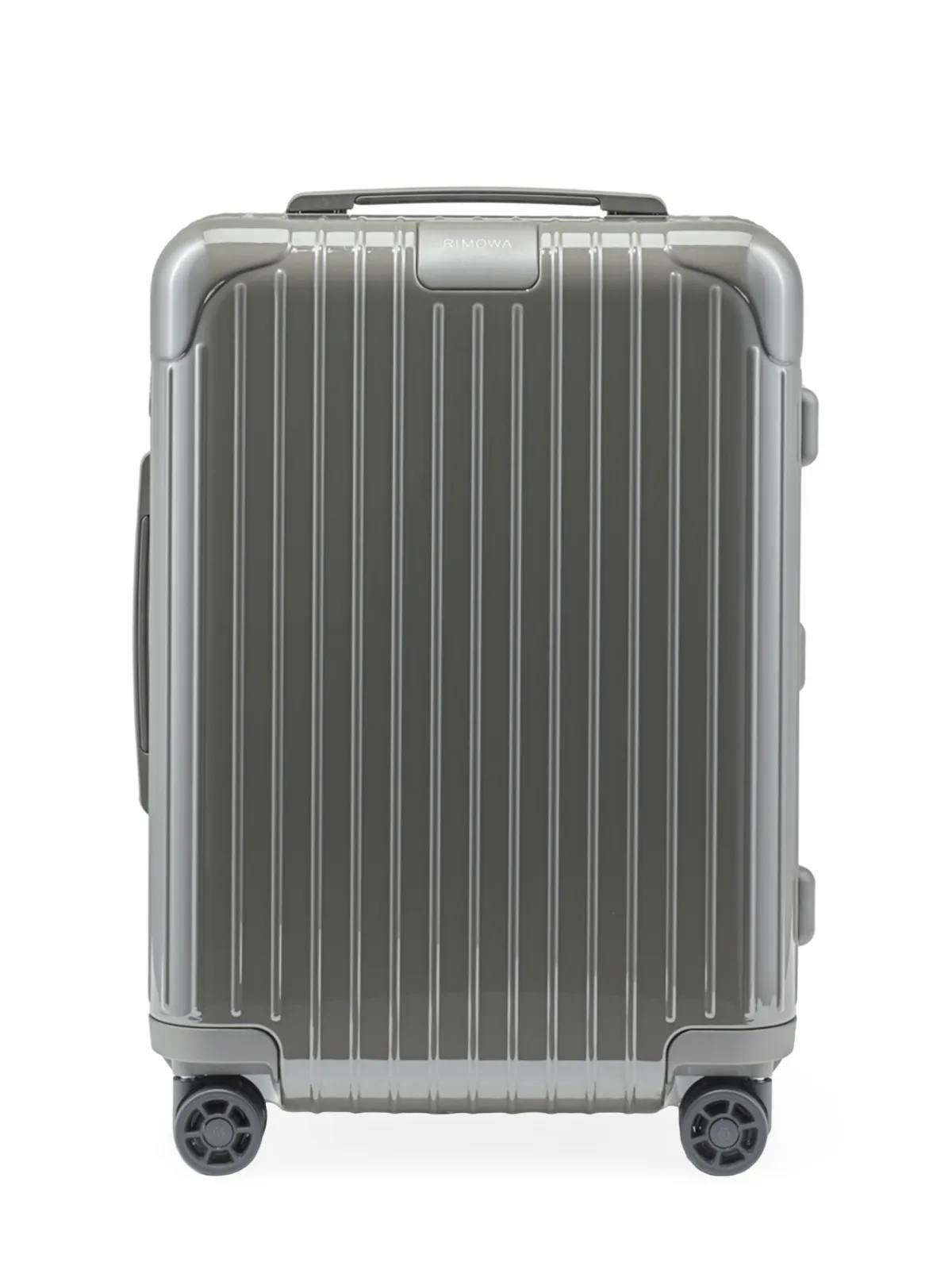 The RIMOWA Essential Cabin suitcase in gloss slate grey, showing the grooved polycarbonate shell and Multiwheel wheels